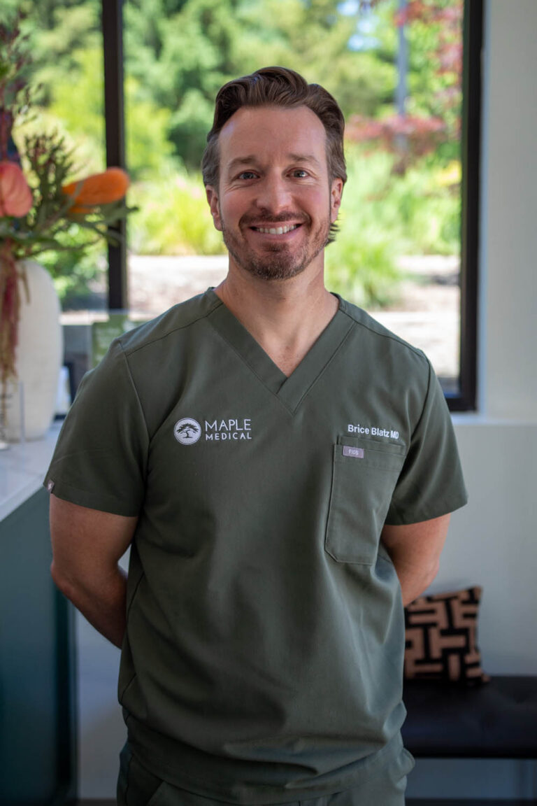 Dr. Brice Blatz standing inside Maple Medical